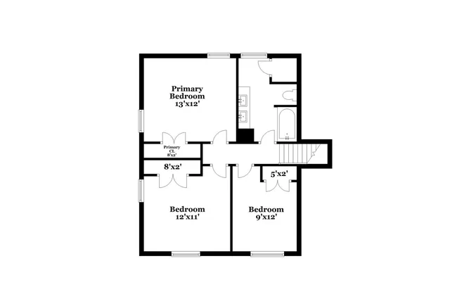 a picture of a bench in front of a wall