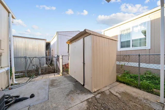 a bathroom with a shower and a sink