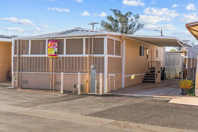 a view of a house with a patio