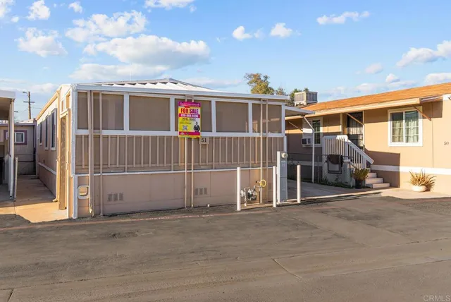 a view of a house with a terrace