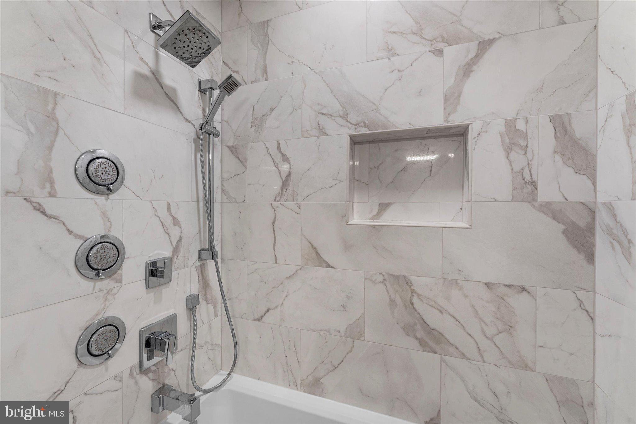 8015 Stillbrooke Road Manassas, VA 20112 - Photo 24 of 34 a bathroom with shower