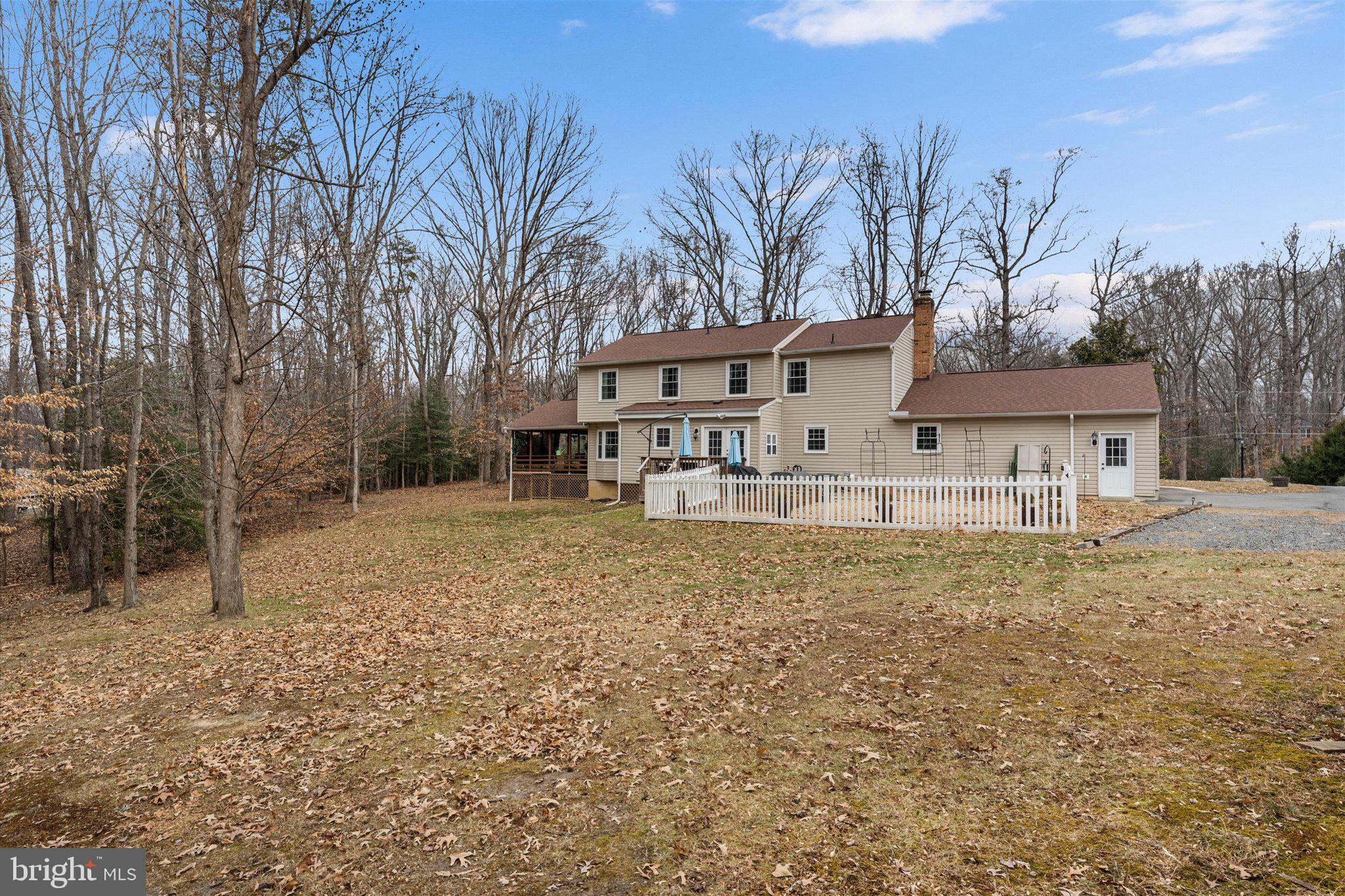 8015 Stillbrooke Road Manassas, VA 20112 - Photo 27 of 34 a front view of a house with garden