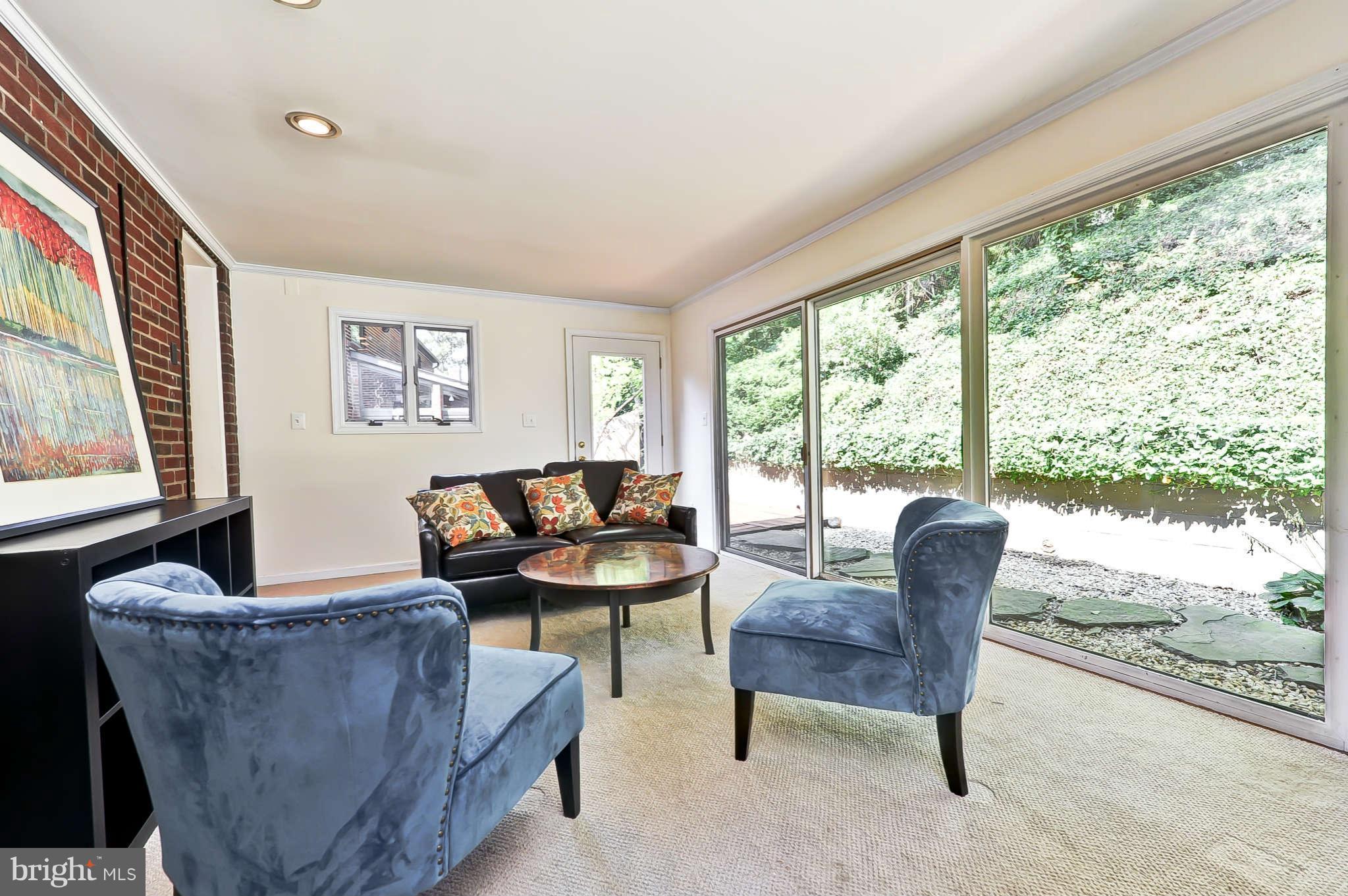 3203 Russell Road Alexandria, VA 22305 - Photo 15 of 30 a living room with furniture and a large window