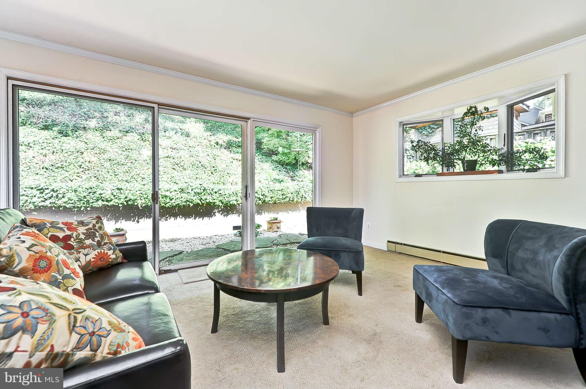 3203 Russell Road Alexandria, VA 22305 - Photo 17 of 30 a living room with furniture and a window