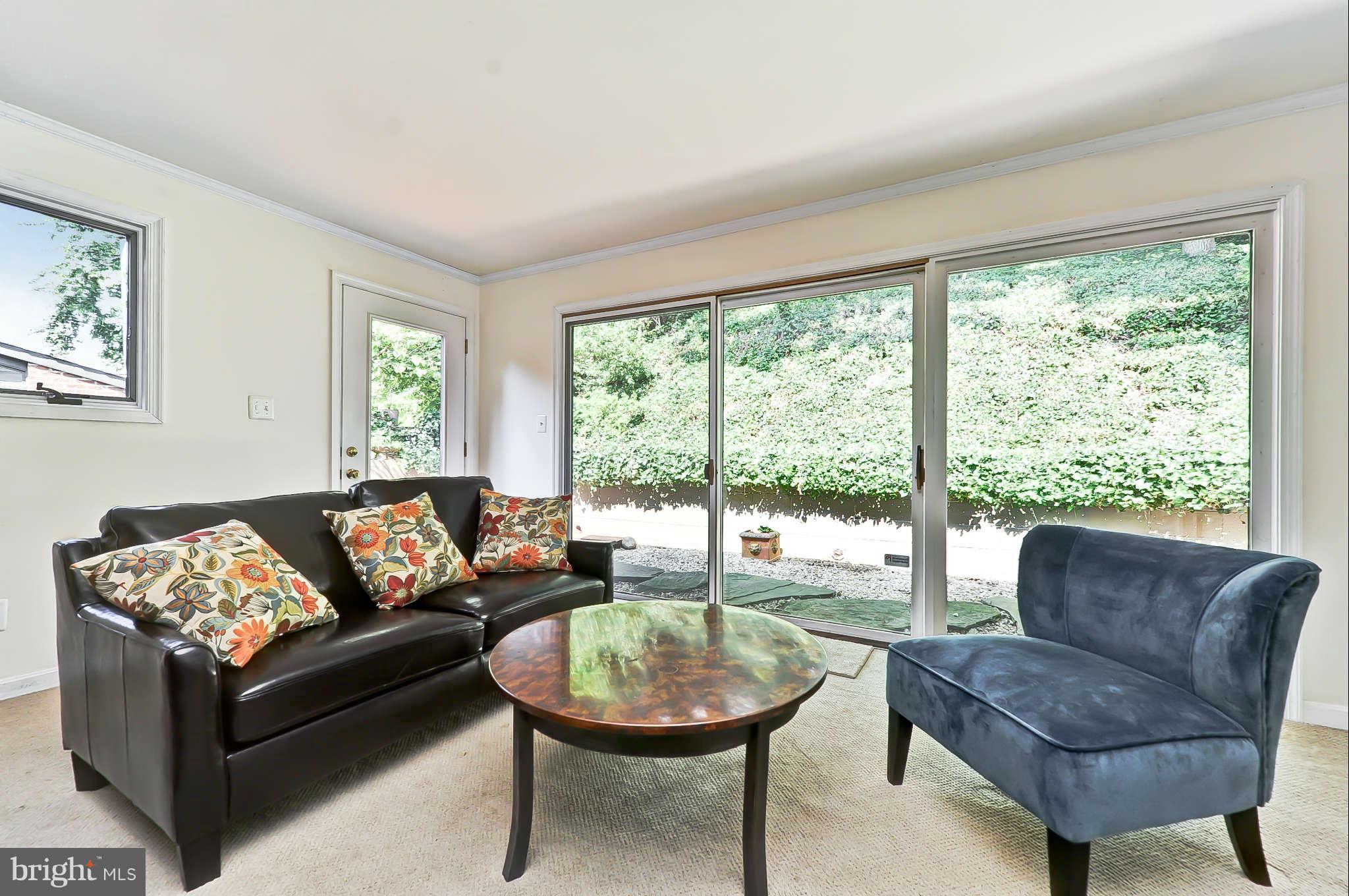 3203 Russell Road Alexandria, VA 22305 - Photo 18 of 30 a living room with furniture and a large window