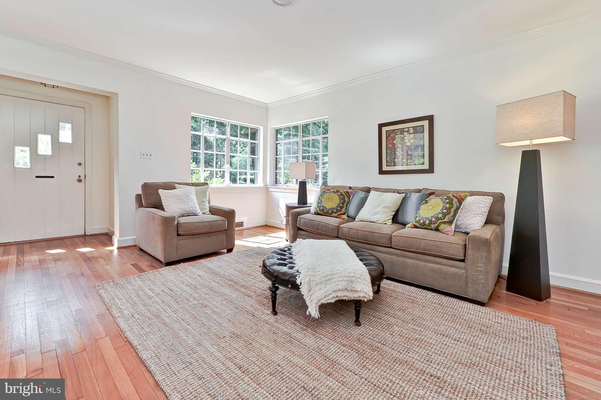 3203 Russell Road Alexandria, VA 22305 - Photo 3 of 30 a living room with furniture and a wooden floor