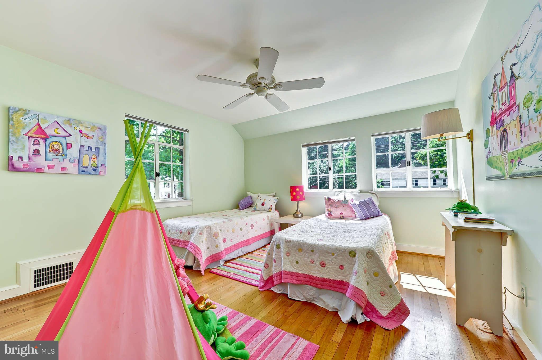 3203 Russell Road Alexandria, VA 22305 - Photo 23 of 30 a bedroom with a bed and a table