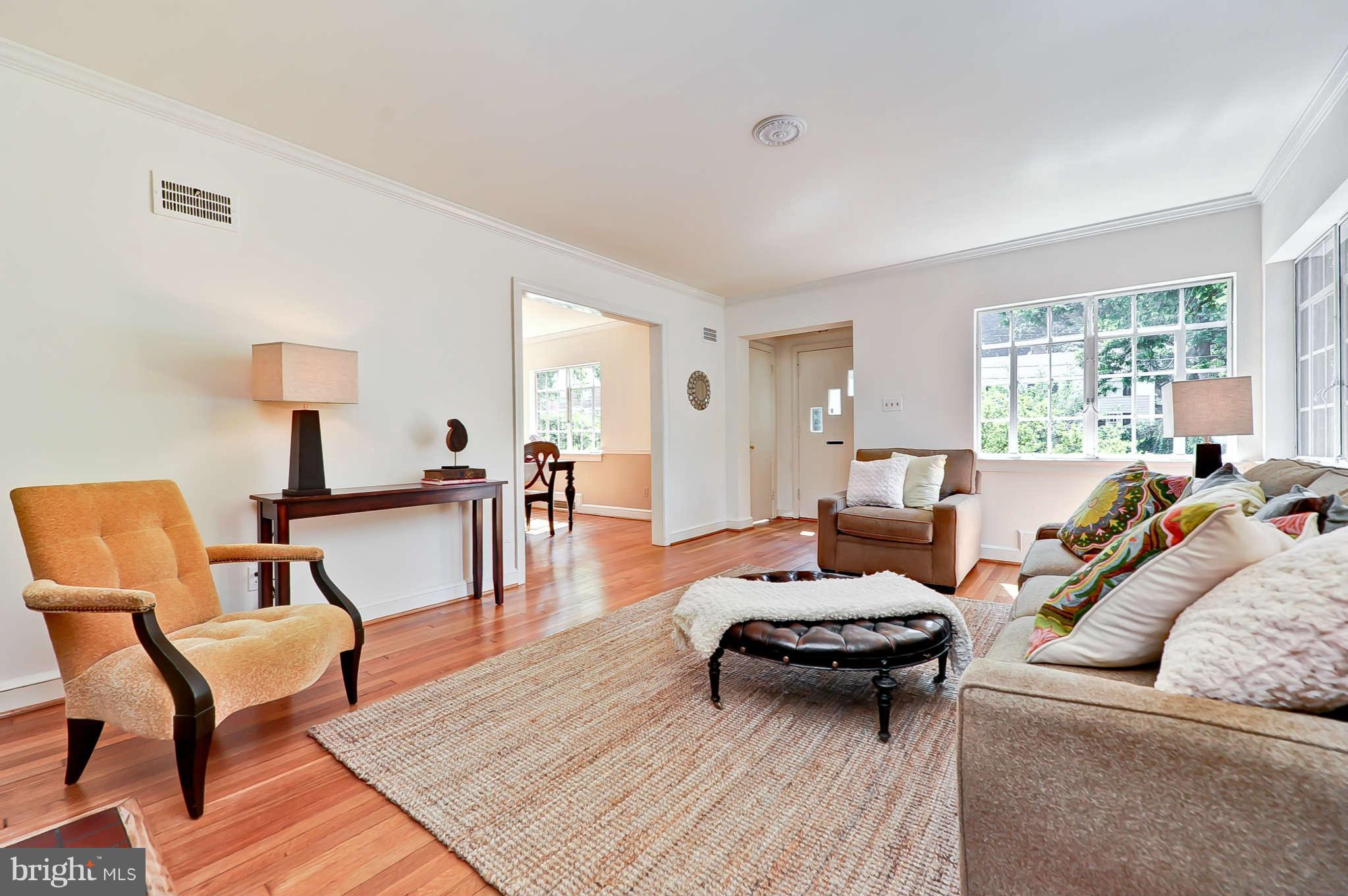 3203 Russell Road Alexandria, VA 22305 - Photo 4 of 30 a living room with furniture and a table