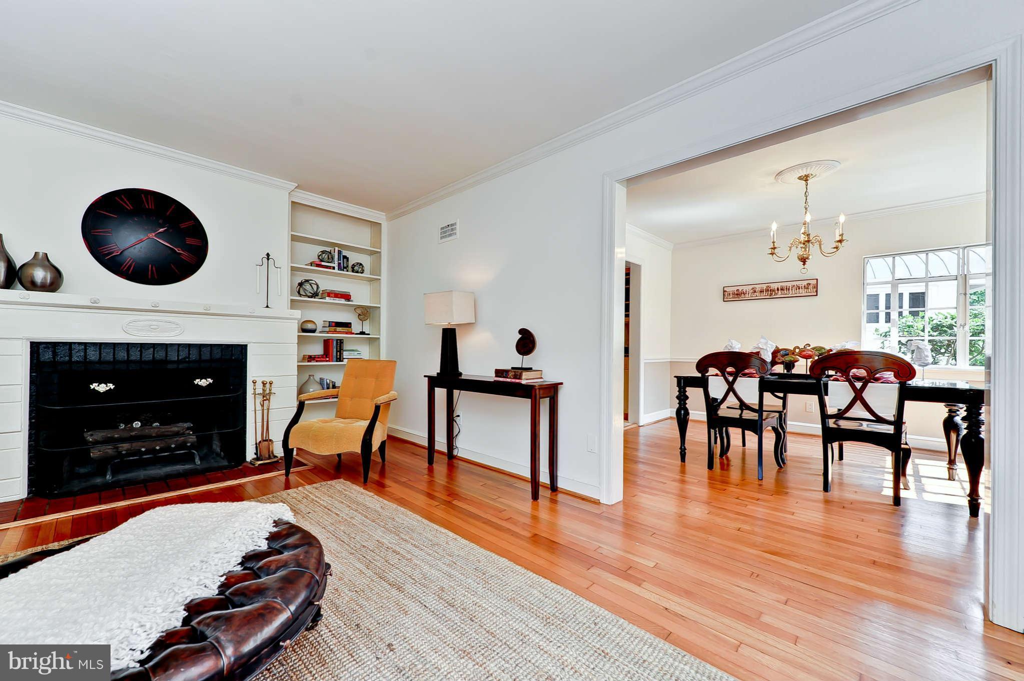 3203 Russell Road Alexandria, VA 22305 - Photo 8 of 30 a living room with furniture and a fireplace