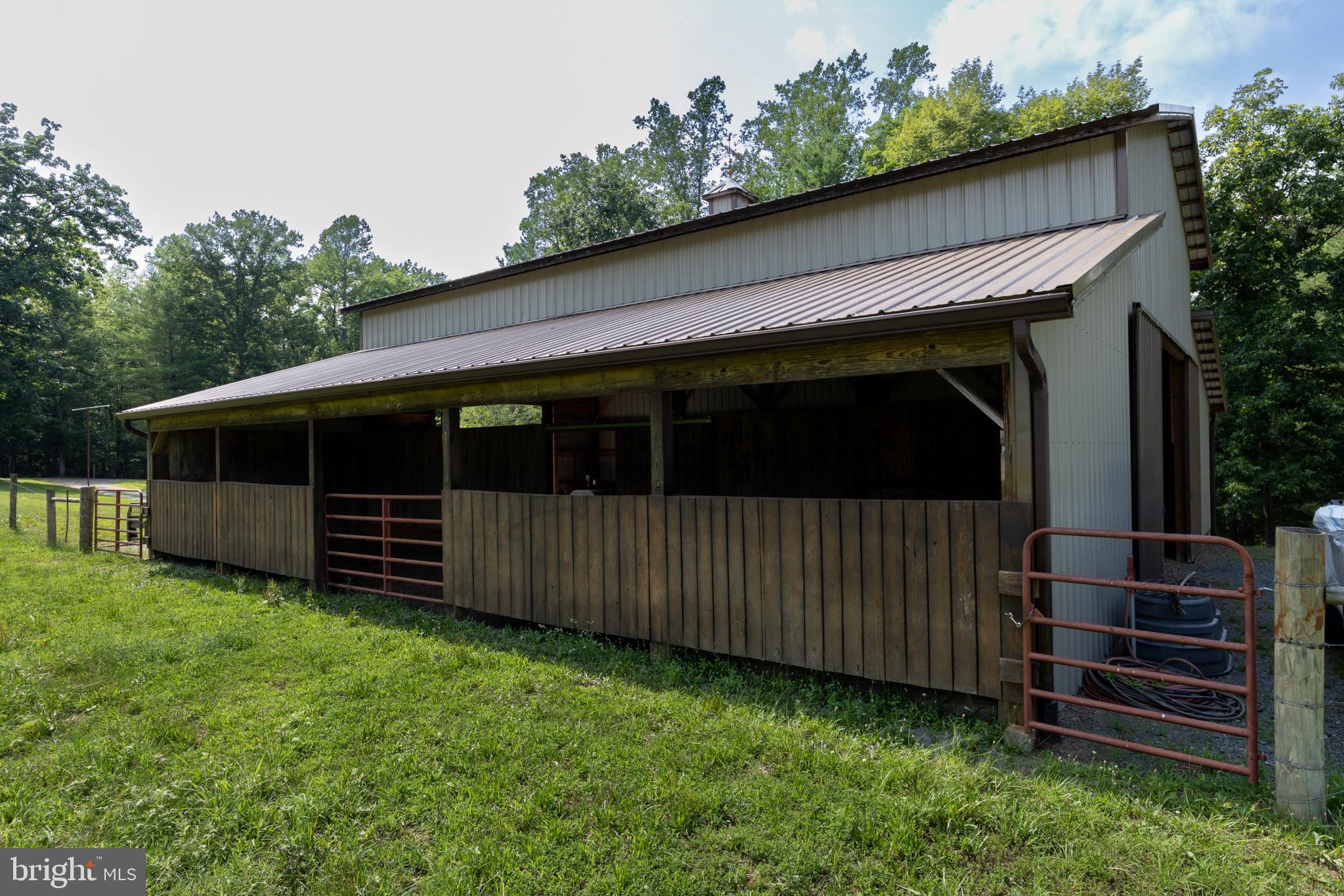 1688 Desert Road Reva, VA 22735 - Photo 66 of 81 a view of a house with a yard