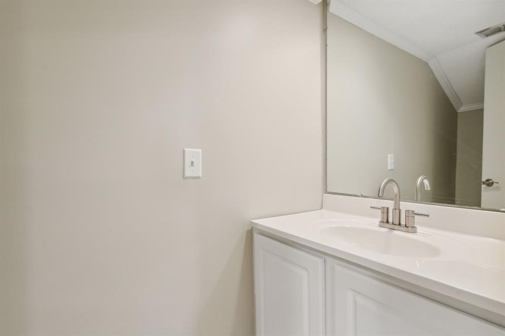 3036 Sea Marsh Road Fernandina Beach, FL 32034 - Photo 13 of 43 a bathroom with a sink and a mirror