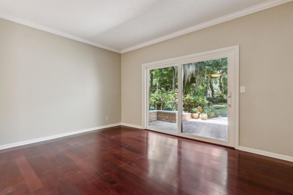 3036 Sea Marsh Road Fernandina Beach, FL 32034 - Photo 14 of 43 a view of wooden floor and windows in a room