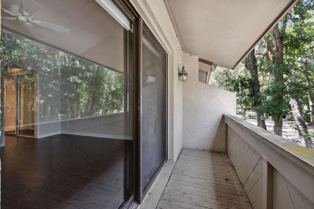 3036 Sea Marsh Road Fernandina Beach, FL 32034 - Photo 22 of 43 a view of a balcony with wooden floor