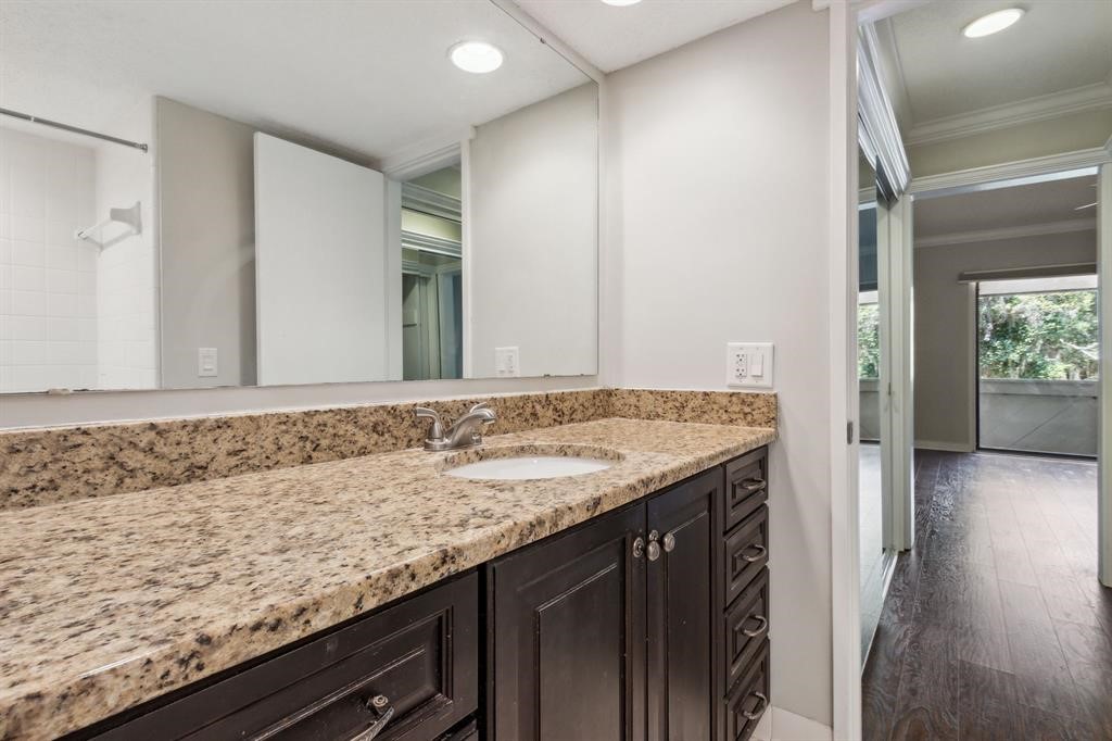 3036 Sea Marsh Road Fernandina Beach, FL 32034 - Photo 24 of 43 a bathroom with a granite countertop sink and a mirror