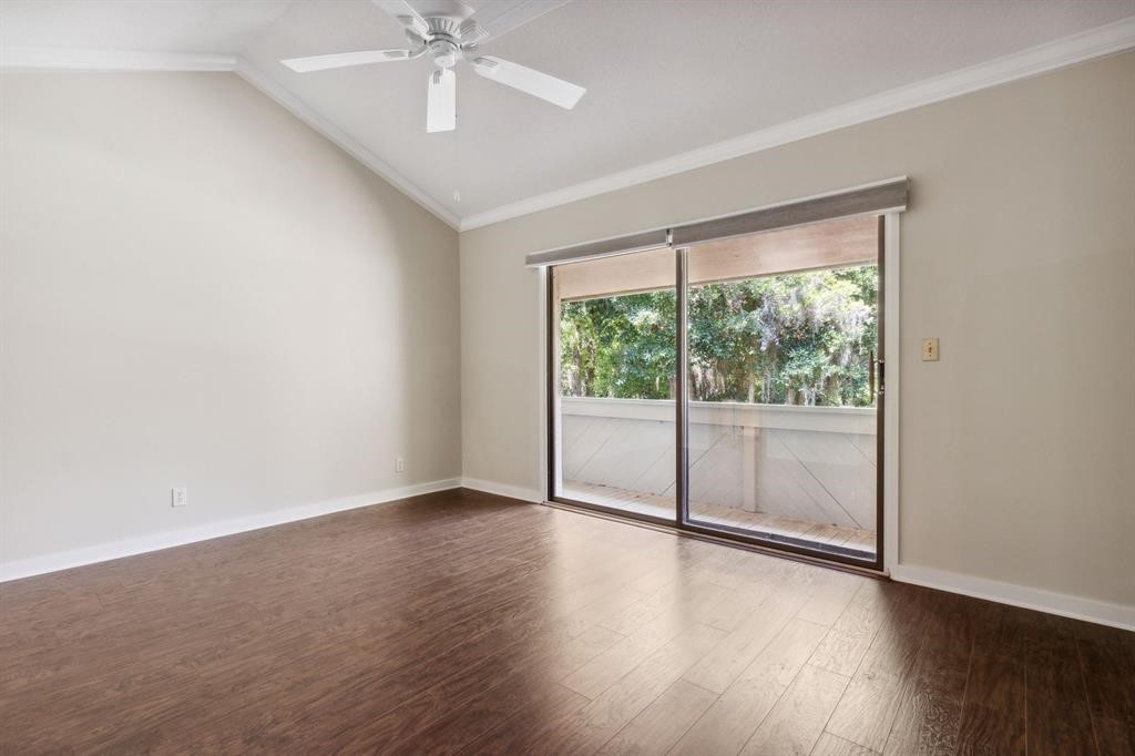 3036 Sea Marsh Road Fernandina Beach, FL 32034 - Photo 3 of 43 a view of an empty room with wooden floor and a window