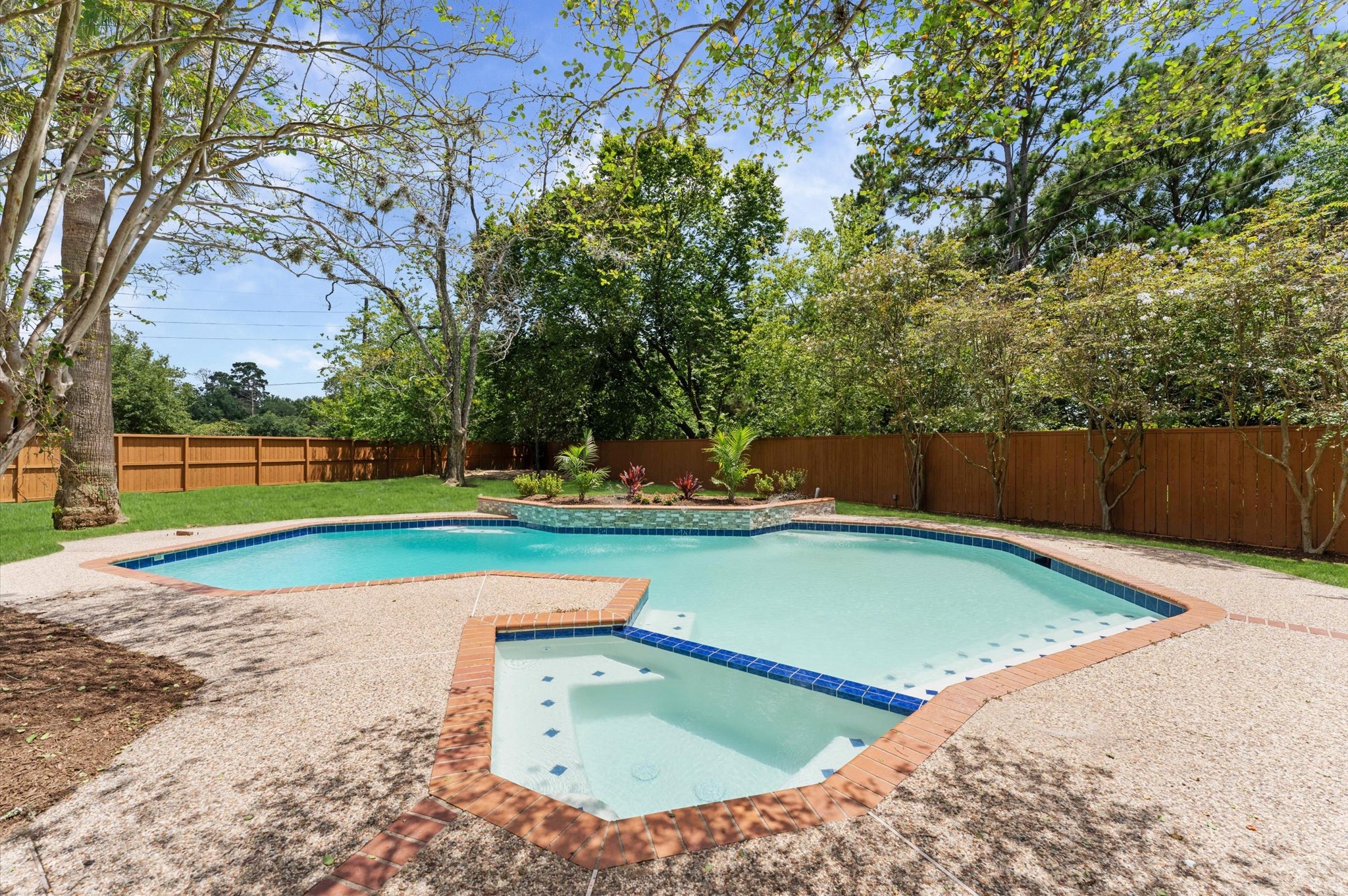 17603 Surreywest Lane Spring, TX 77379 - Photo 2 of 35 The pool has been extensively upgraded and is ready for you to enjoy year-round