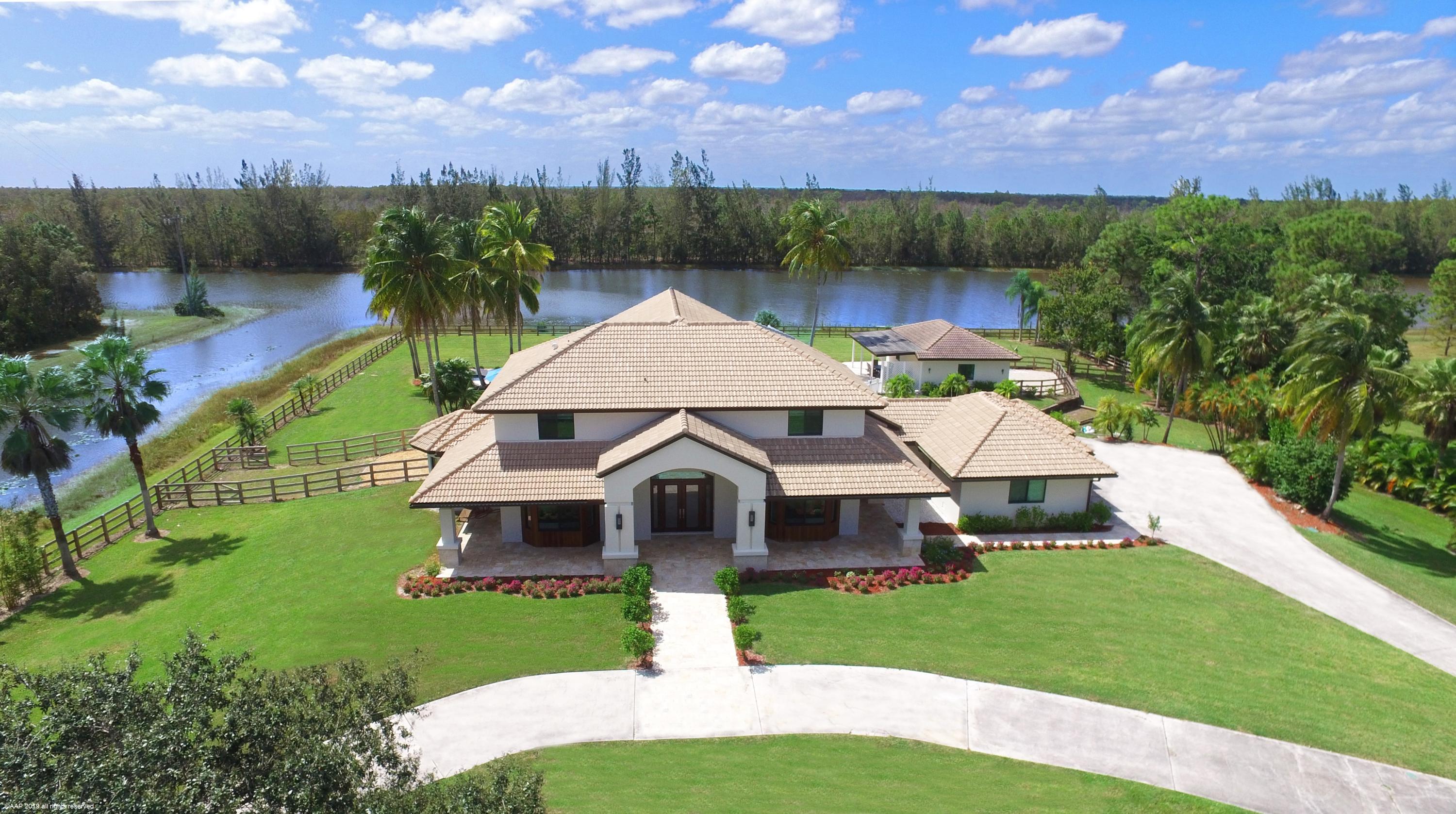 6449 Duckweed Road Lake Worth, FL 33449 - Photo 2 of 49 Front Elevation - Aerial