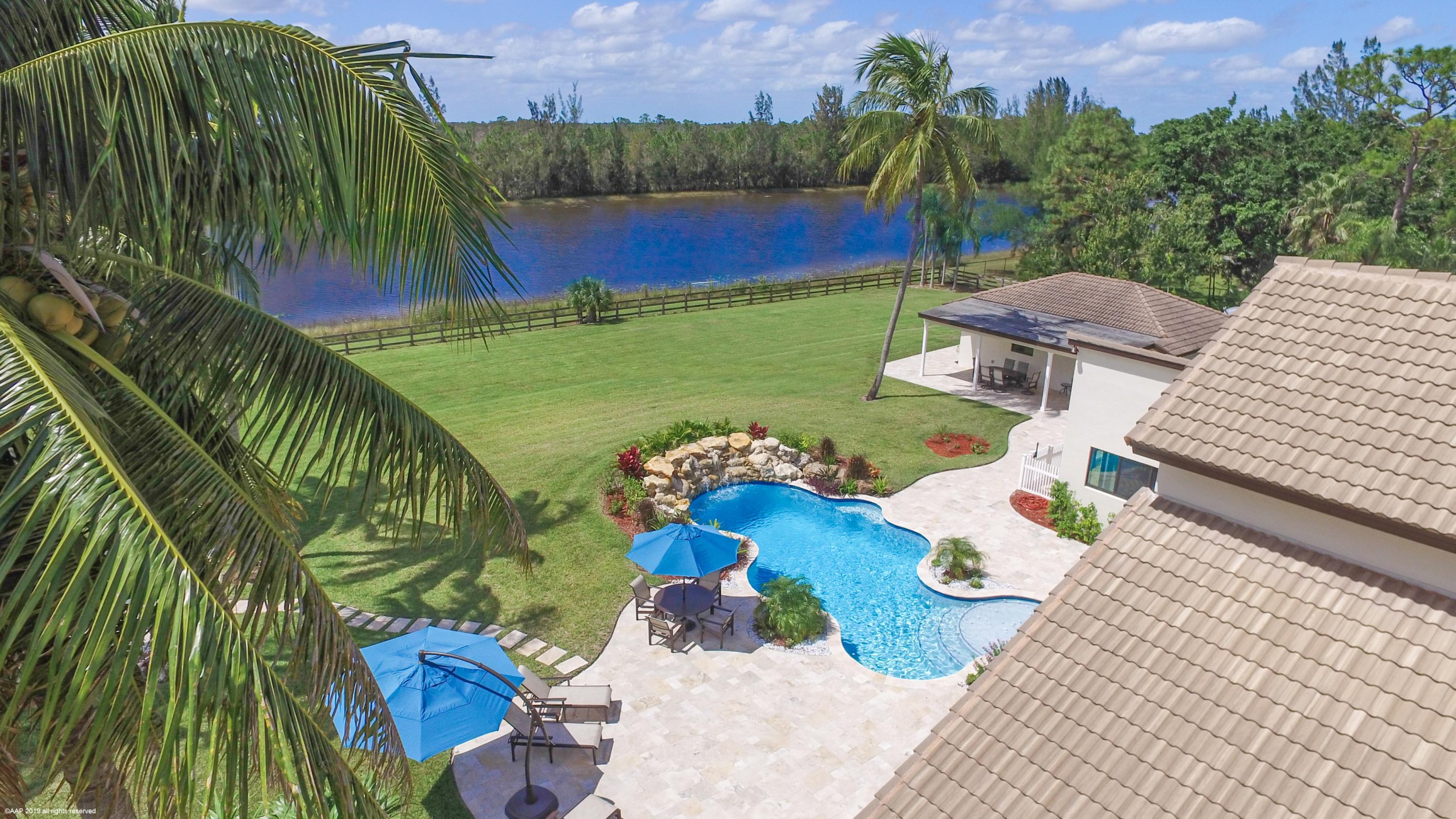 6449 Duckweed Road Lake Worth, FL 33449 - Photo 36 of 49 Aerial of Pool and Patio View