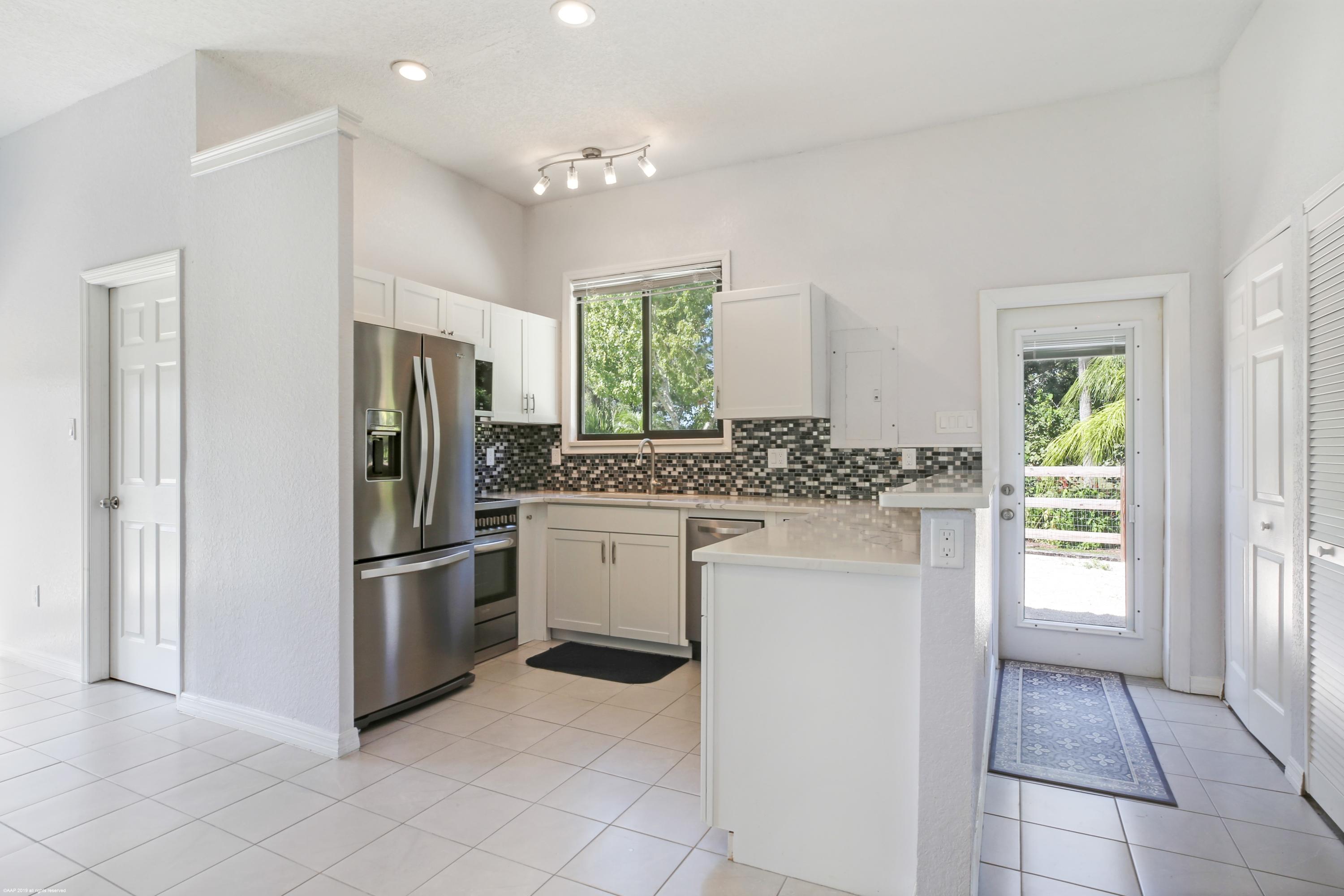 6449 Duckweed Road Lake Worth, FL 33449 - Photo 38 of 49 Guest House Kitchen