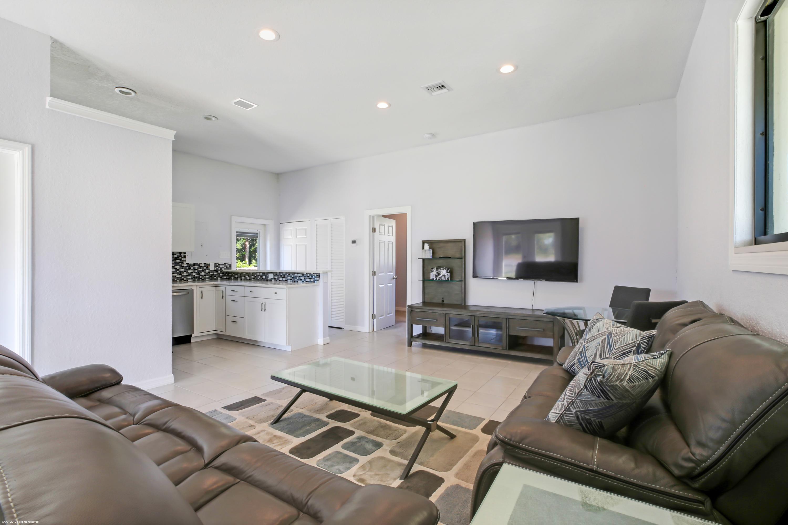 6449 Duckweed Road Lake Worth, FL 33449 - Photo 39 of 49 Guest House Living room