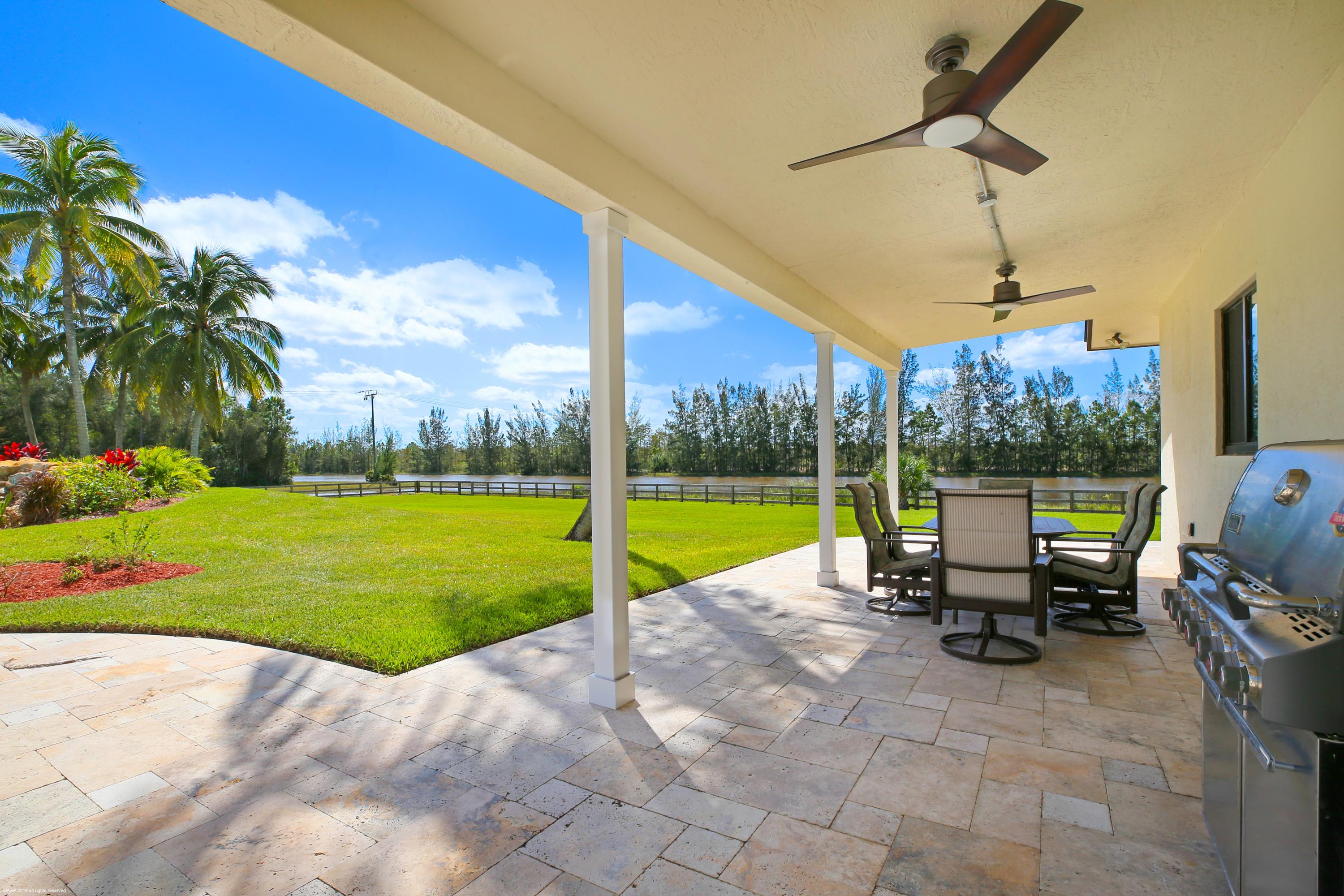 6449 Duckweed Road Lake Worth, FL 33449 - Photo 43 of 49 Patio at Guest House