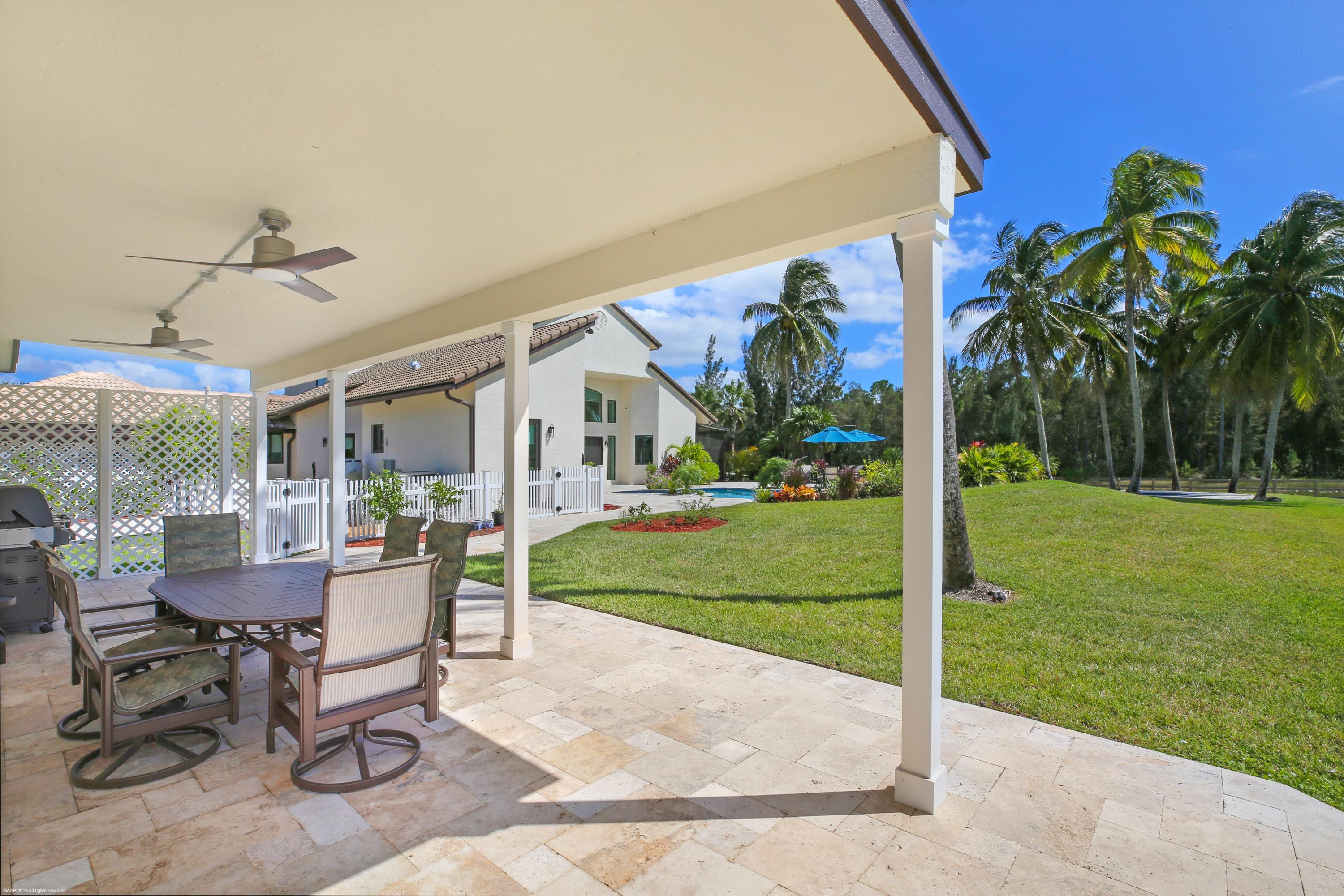 6449 Duckweed Road Lake Worth, FL 33449 - Photo 44 of 49 Patio Area at Guest House