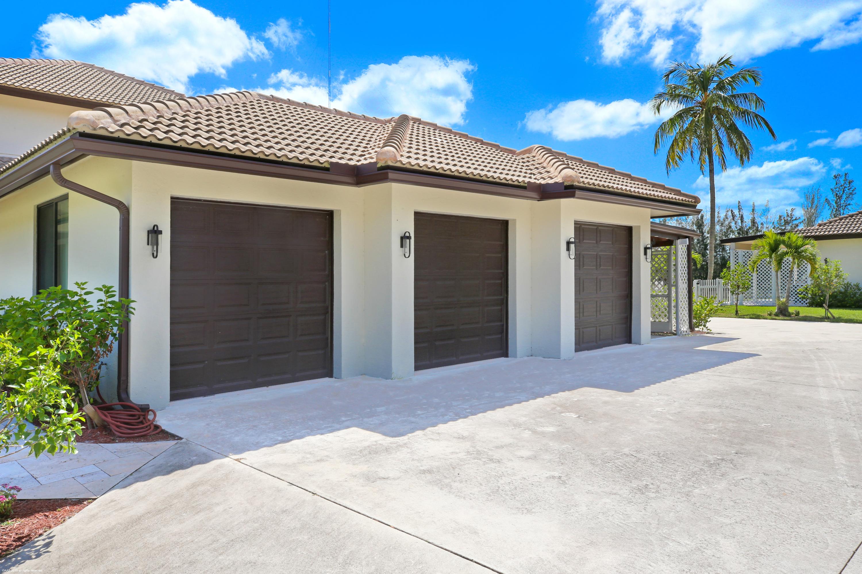 6449 Duckweed Road Lake Worth, FL 33449 - Photo 45 of 49 3 Car Garage