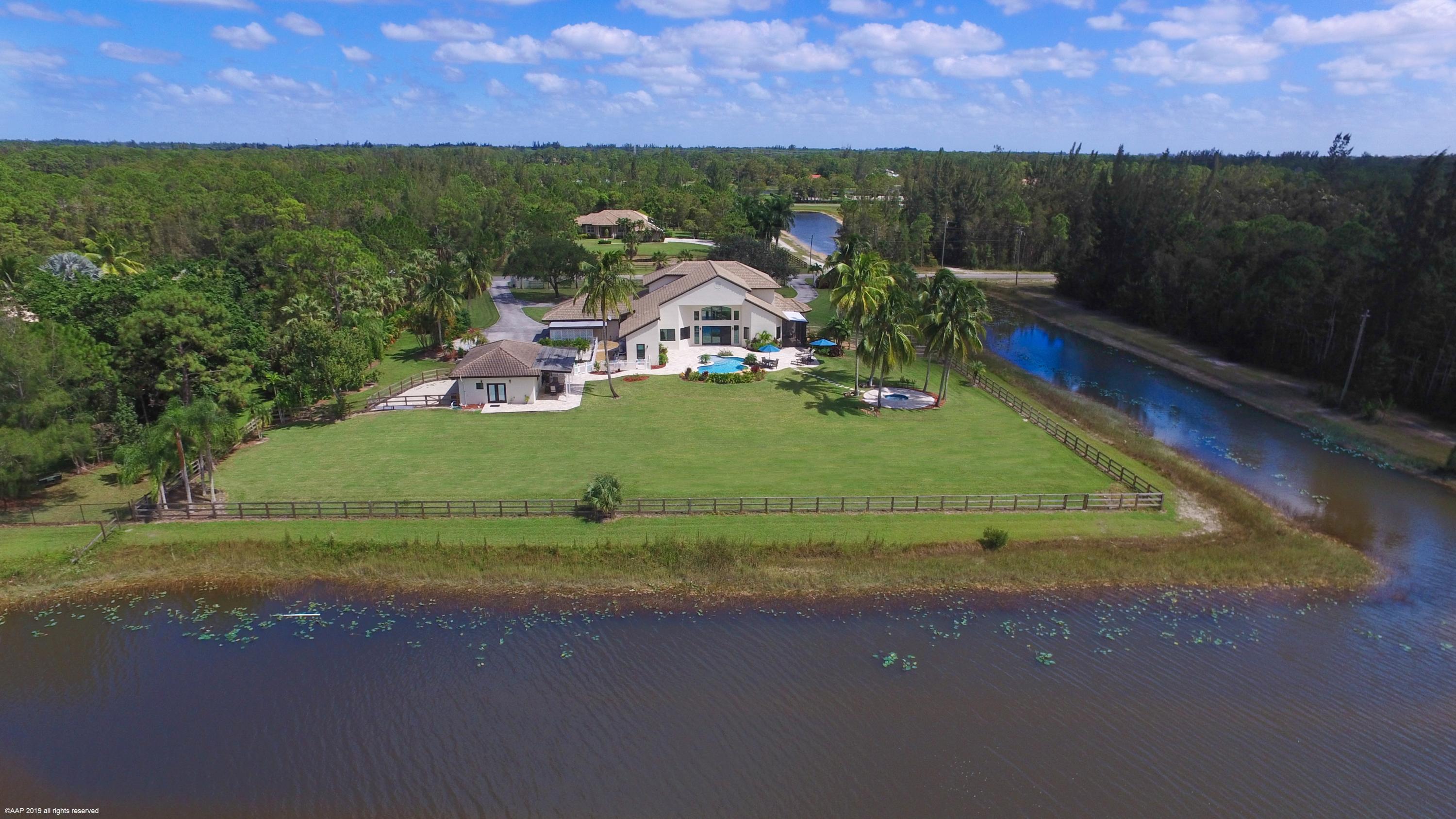 6449 Duckweed Road Lake Worth, FL 33449 - Photo 47 of 49 Rear Elevation