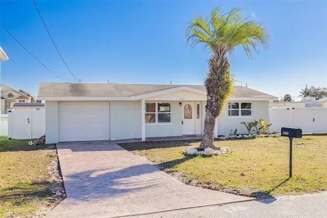 a house view with a backyard space