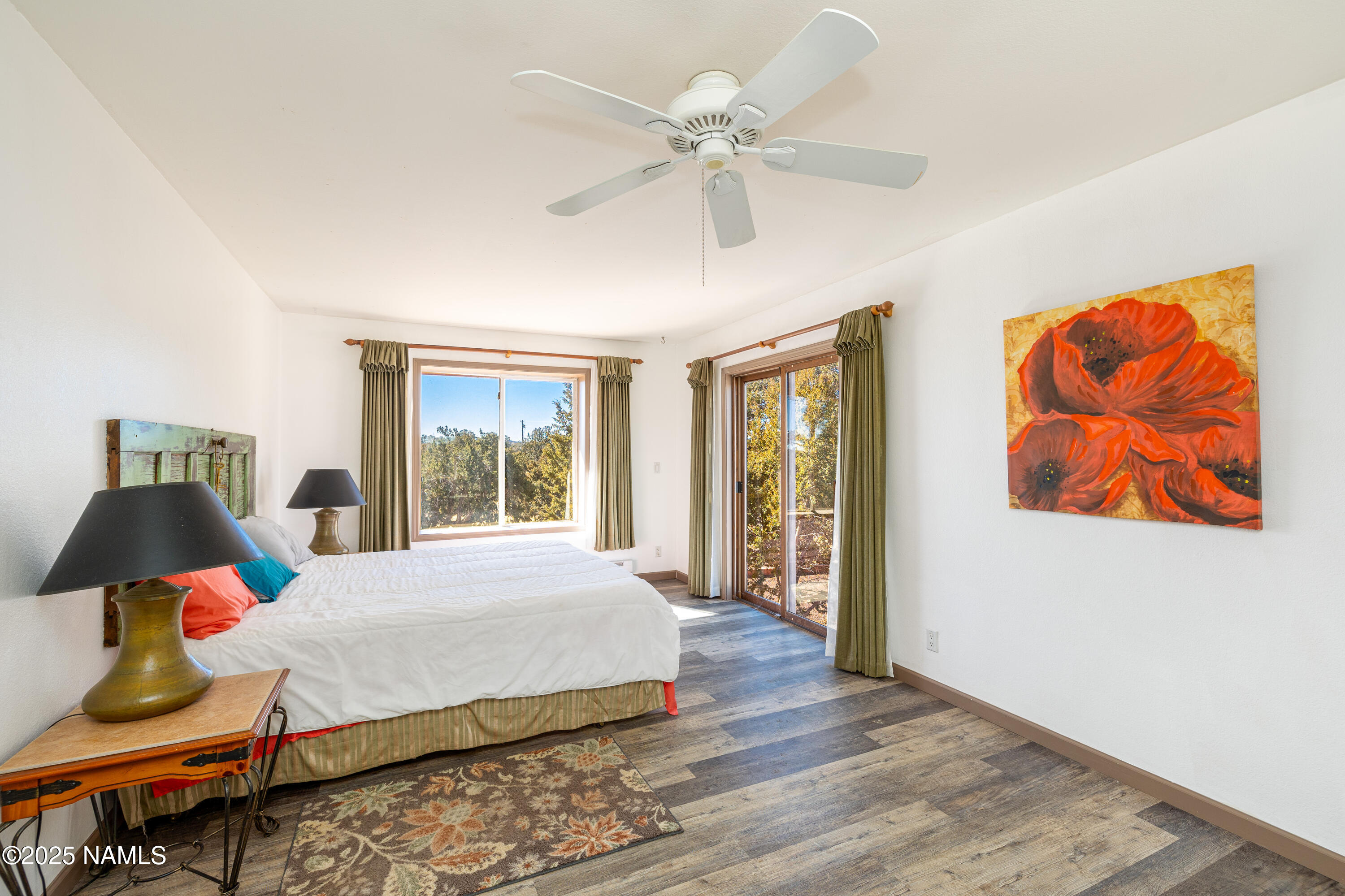 5966 East Camden Road Flagstaff, AZ 86004 - Photo 21 of 70 a bedroom with a bed and window