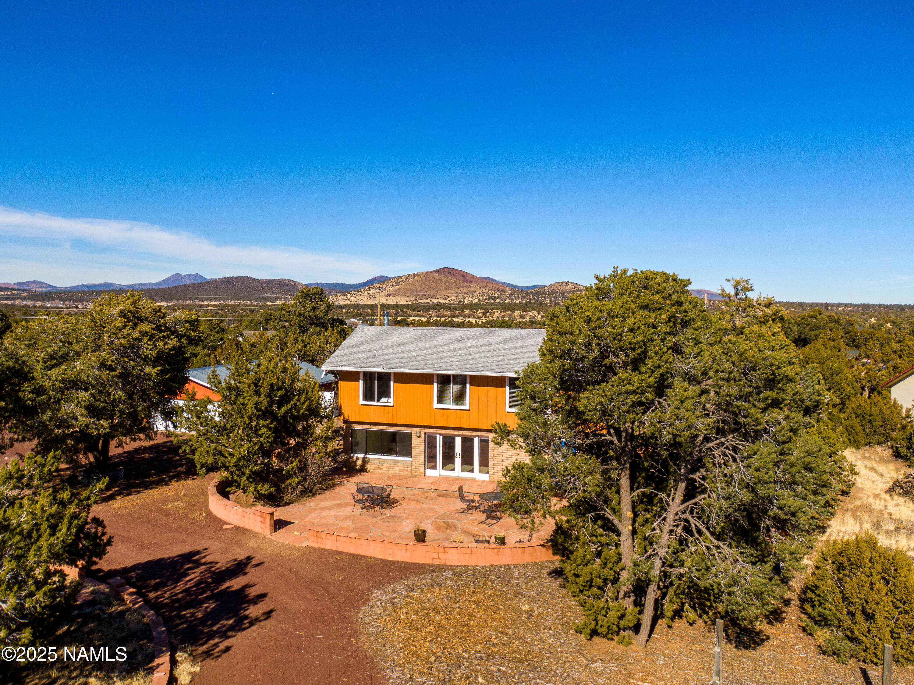5966 East Camden Road Flagstaff, AZ 86004 - Photo 56 of 70 a view of a city with a mountain in the background