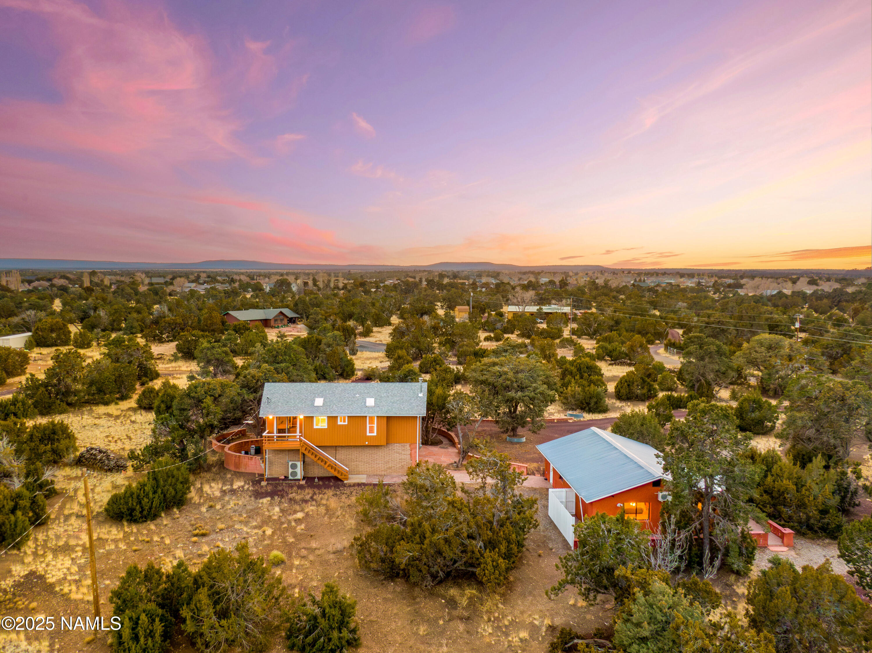 5966 East Camden Road Flagstaff, AZ 86004 - Photo 59 of 70 an aerial view of house with yard and mountain view in back