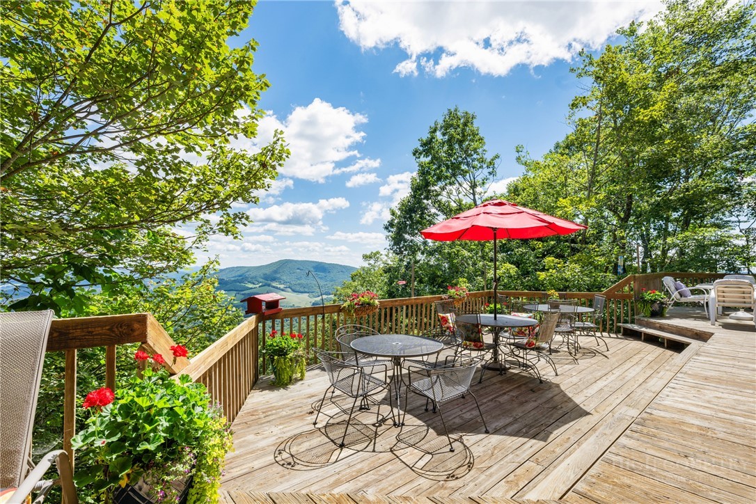 2177 Homestead Road Todd, NC 28684 - Photo 30 of 49 an outdoor space with patio furniture and potted plants