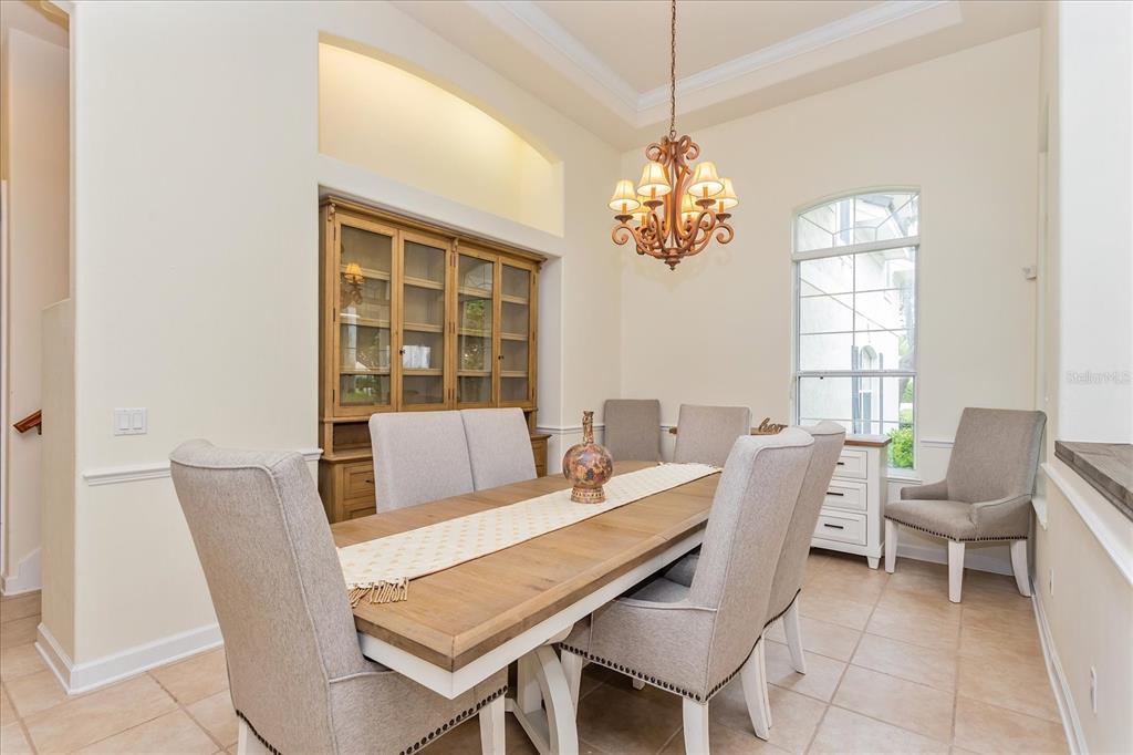 10606 Boca Pointe Drive Orlando, FL 32836 - Photo 13 of 39 a view of a dining room with furniture window and outside view