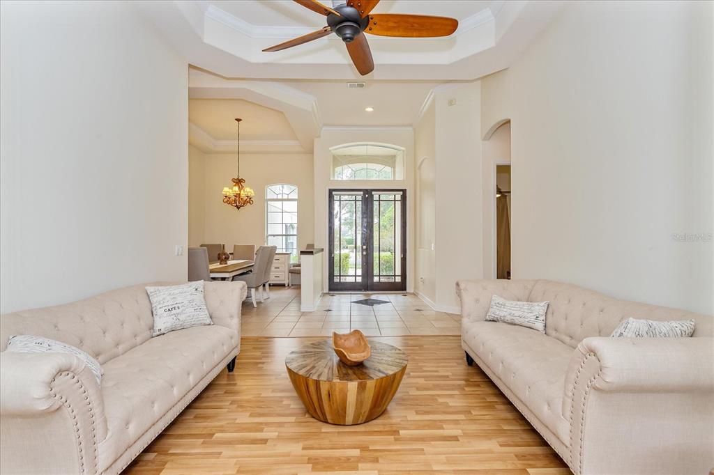 10606 Boca Pointe Drive Orlando, FL 32836 - Photo 15 of 39 a living room with furniture and a large window