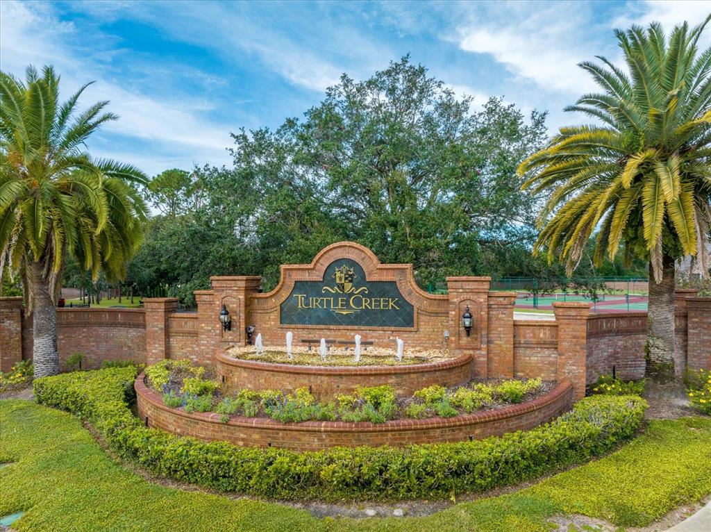 10606 Boca Pointe Drive Orlando, FL 32836 - Photo 2 of 39 a garden with palm trees