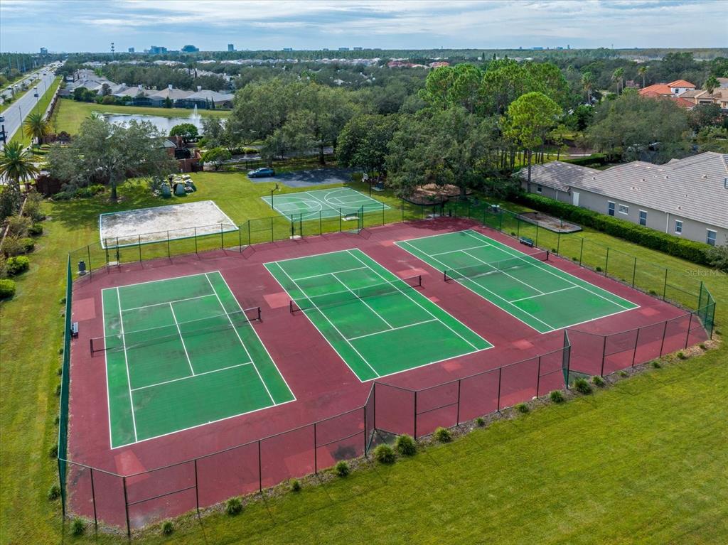 10606 Boca Pointe Drive Orlando, FL 32836 - Photo 5 of 39 a green field with lots of trees in it