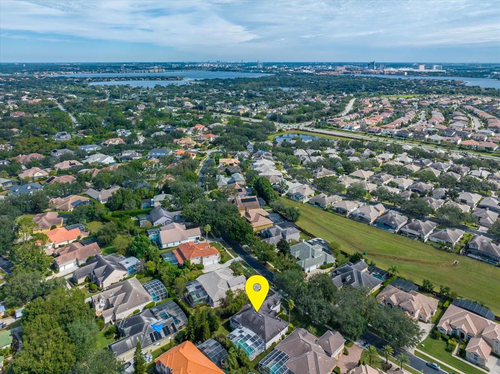 10606 Boca Pointe Drive Orlando, FL 32836 - Photo 8 of 39 an aerial view of residential building with outdoor space and swimming pool