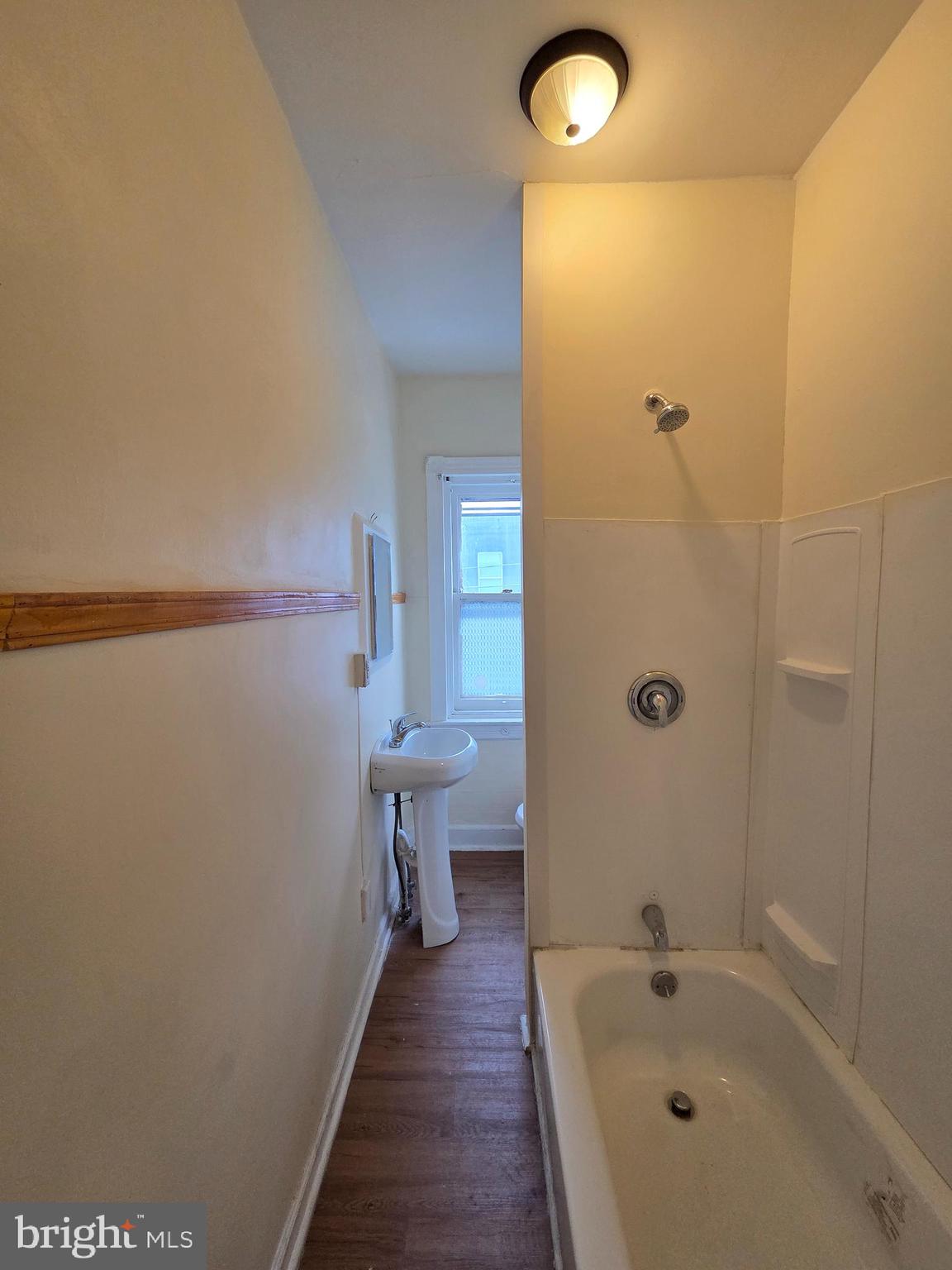 1135 Cotton Street Reading, PA 19602 - Photo 12 of 17 a bathroom with a tub and sink