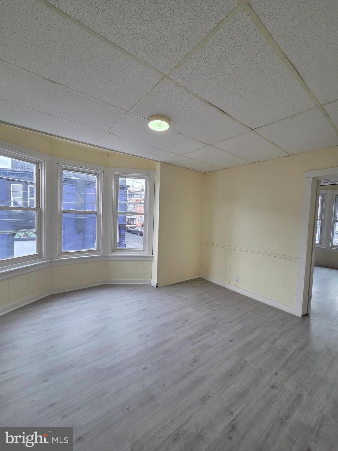 1135 Cotton Street Reading, PA 19602 - Photo 10 of 17 an empty room with windows