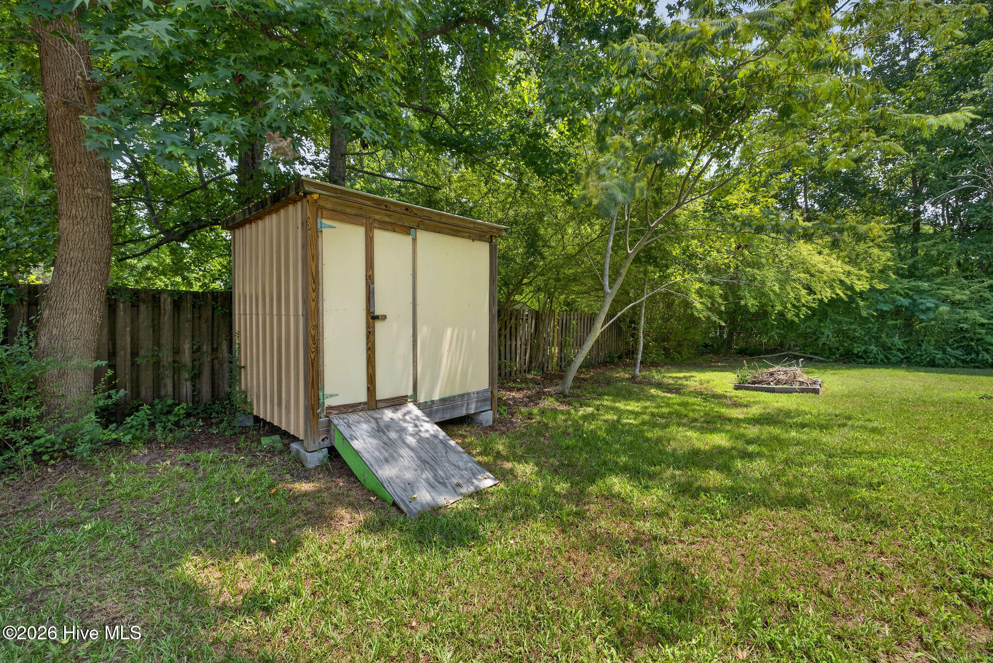 1544 Lanvale Road Leland, NC 28451 - Photo 22 of 30 garden shed for lawn equipment and beach gear