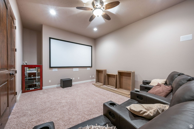 2376 Stone Crest Circle St. George, UT 84790 - Photo 40 of 61 Carpeted cinema with a ceiling fan and recessed lighting