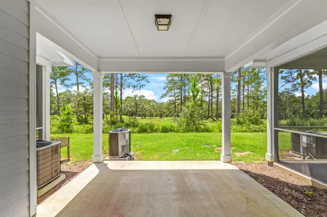 a view of a garden with an outdoor space