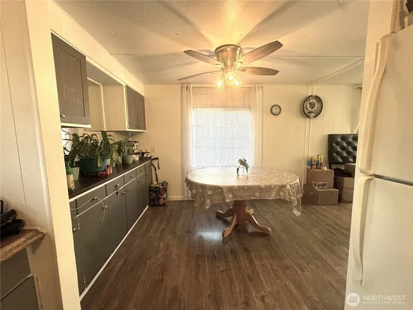 a bathroom with a sink a mirror and a shower