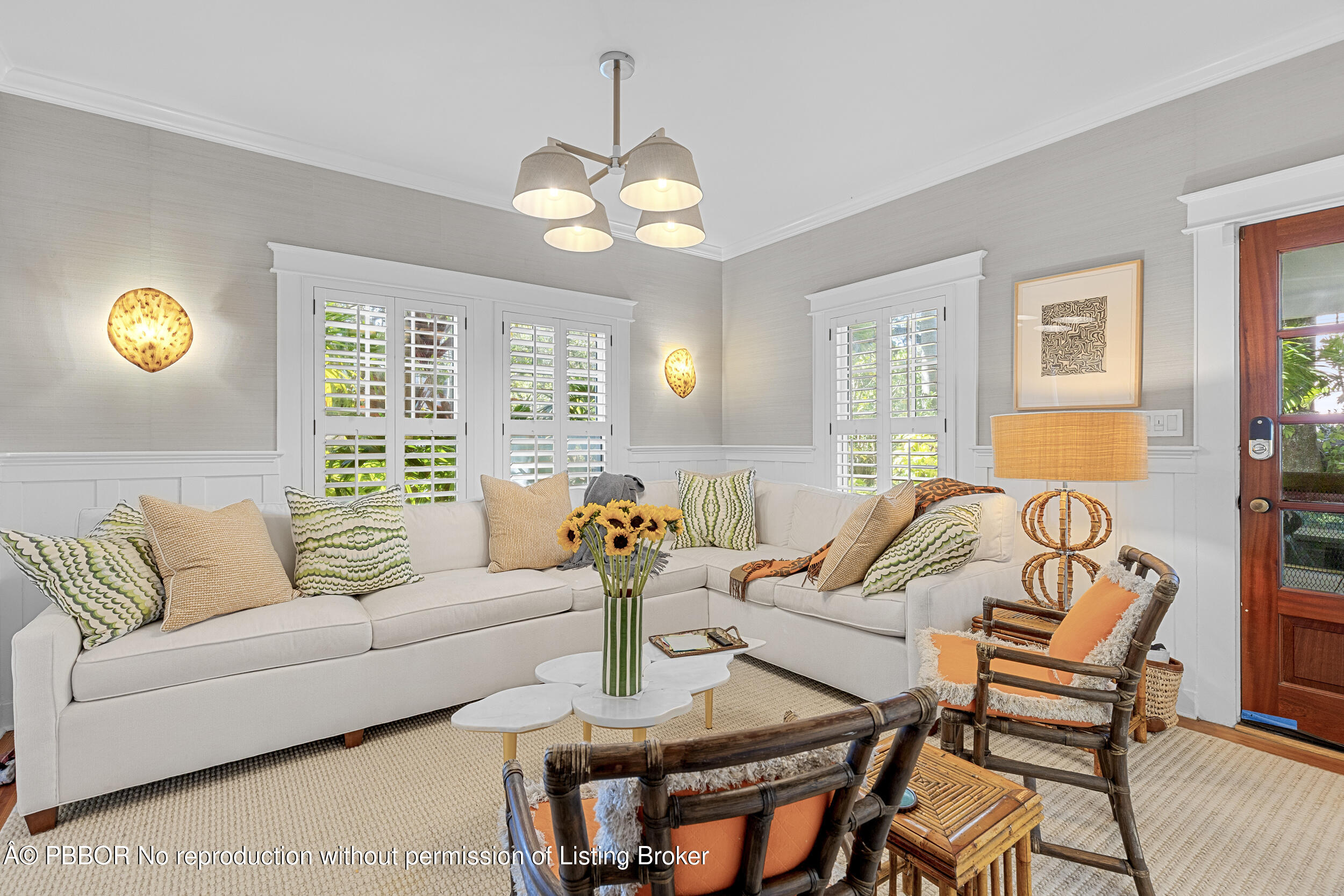 321 Croton Way West Palm Beach, FL 33401 - Photo 15 of 40 a living room with furniture and a chandelier