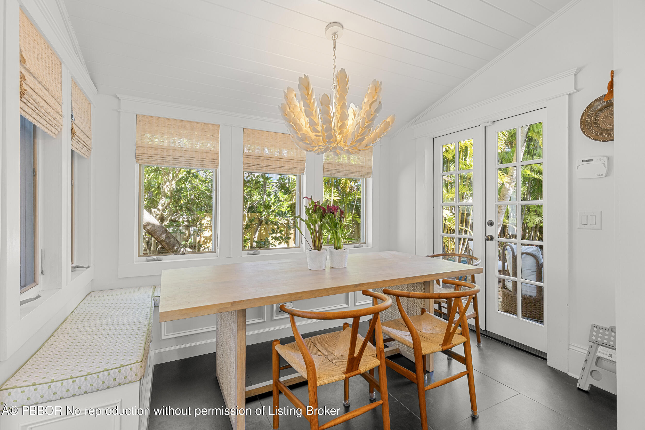 321 Croton Way West Palm Beach, FL 33401 - Photo 19 of 40 a view of a dining room with furniture window and outside view