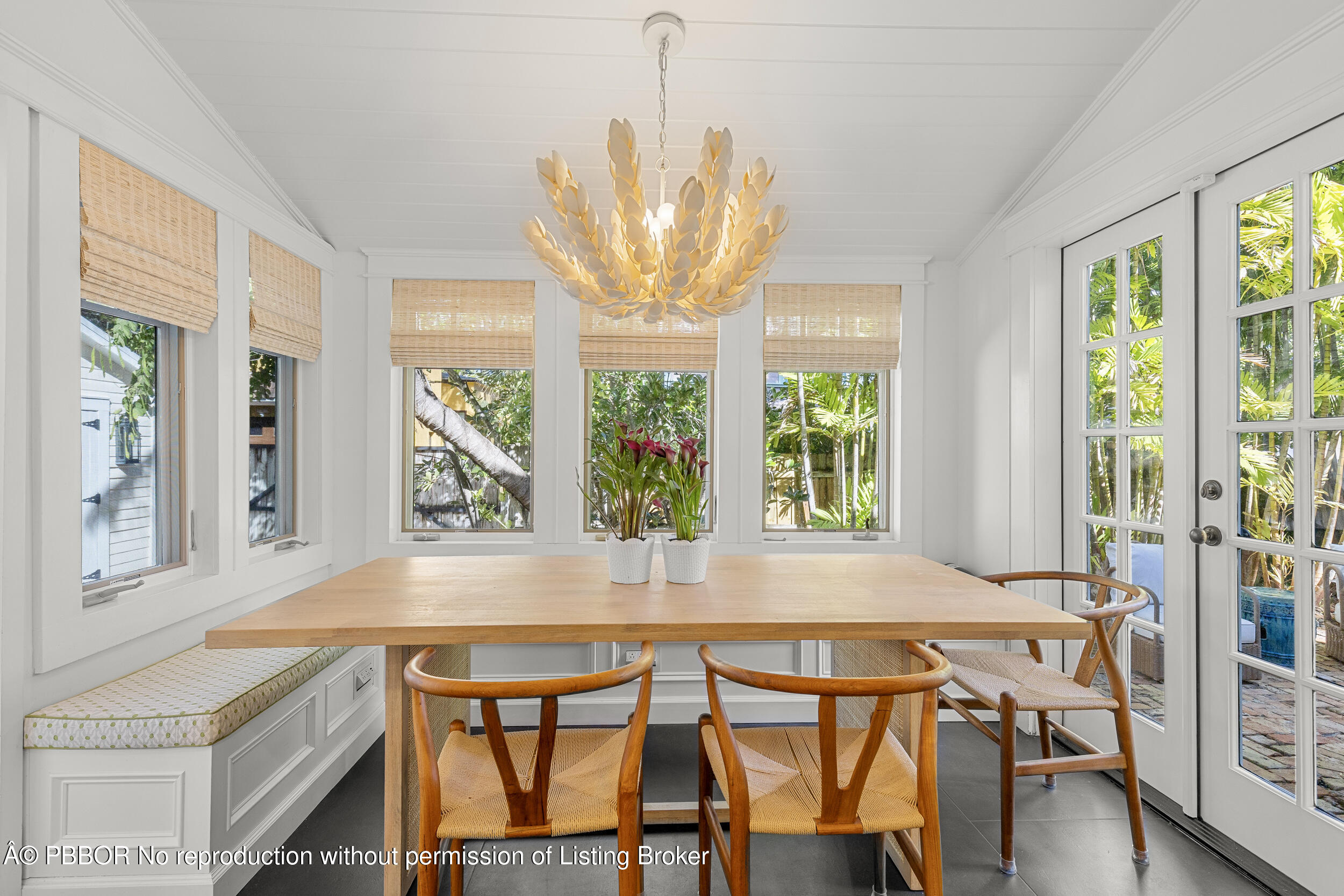 321 Croton Way West Palm Beach, FL 33401 - Photo 20 of 40 a view of a dining room with furniture and windows
