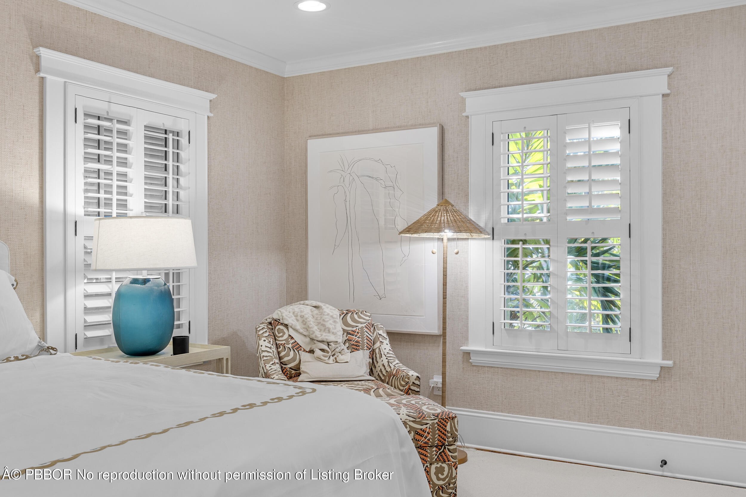 321 Croton Way West Palm Beach, FL 33401 - Photo 26 of 40 a bedroom with a large bed and a window