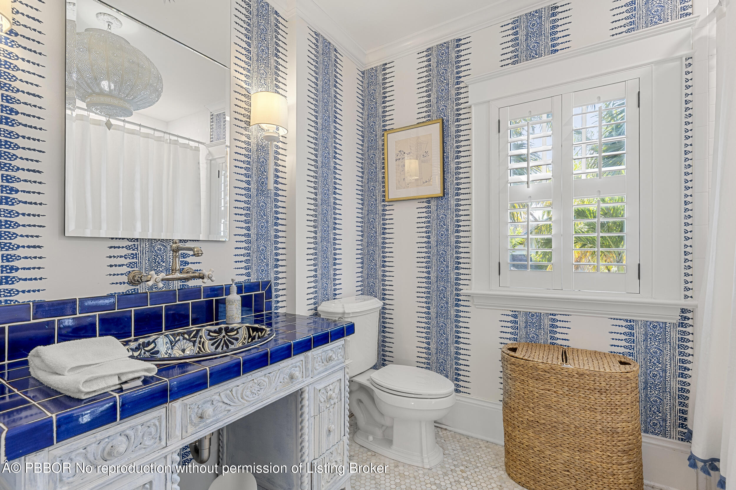 321 Croton Way West Palm Beach, FL 33401 - Photo 33 of 40 a bathroom with a toilet a sink and a window