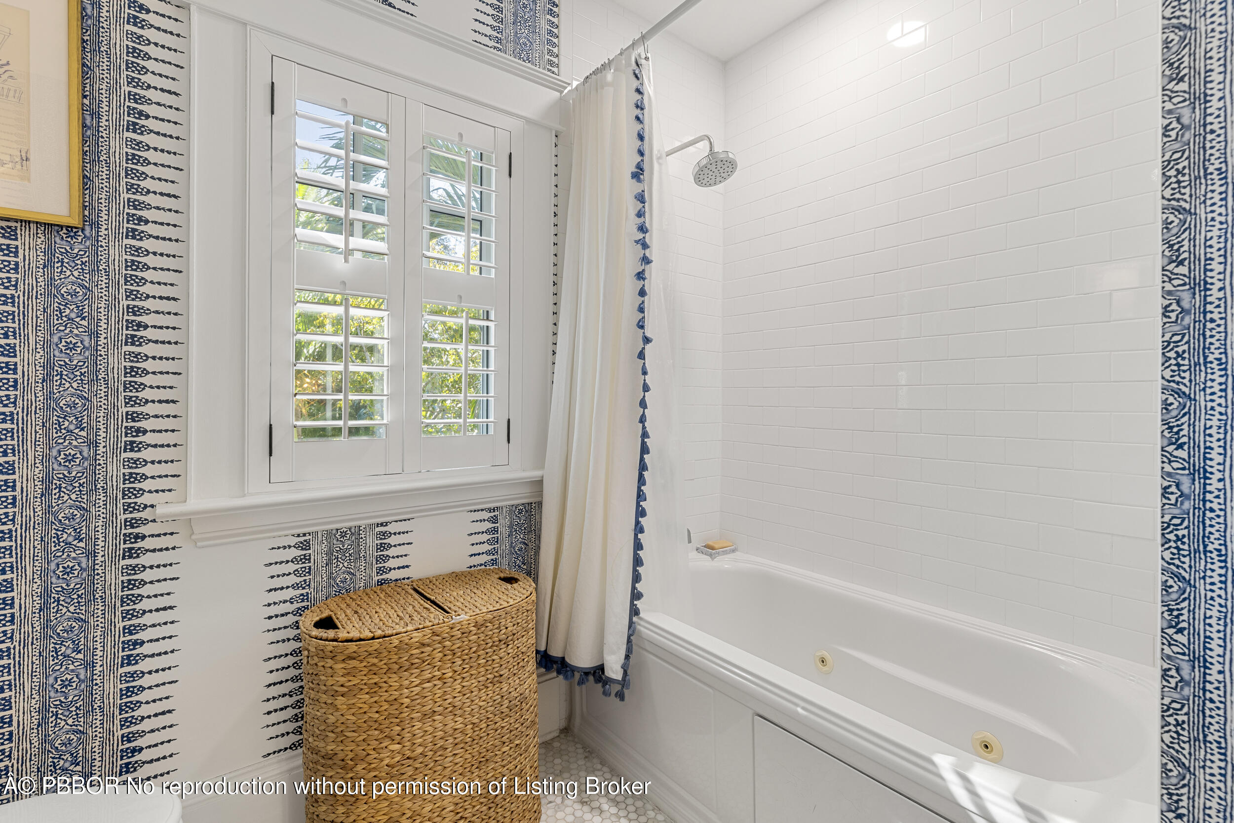 321 Croton Way West Palm Beach, FL 33401 - Photo 34 of 40 a bathroom with a tub shower and a sink